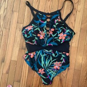 3X one piece suit . Black turquoise print